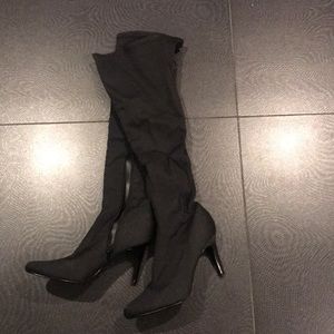 Knee high boots the material on top is stretch